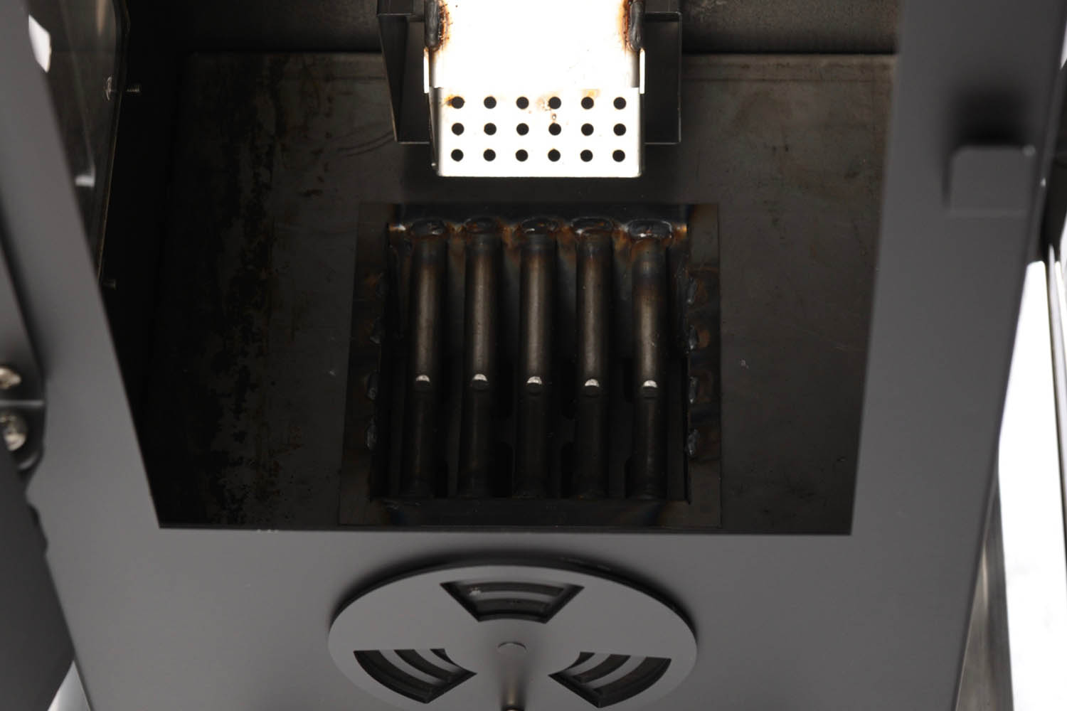 The Inner workings of a wood pellet patio heater.