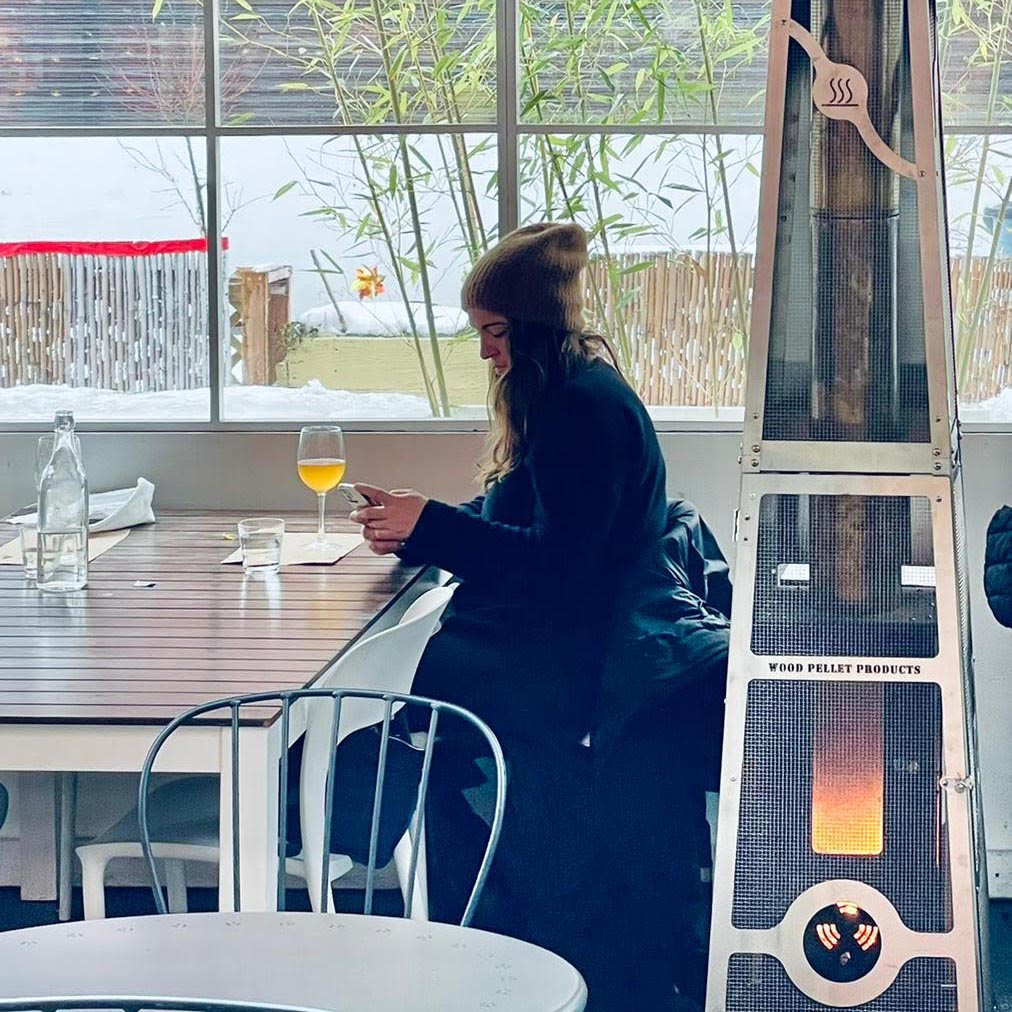 commercial-heater-2021 Patio heater warming customers at a restaurant.